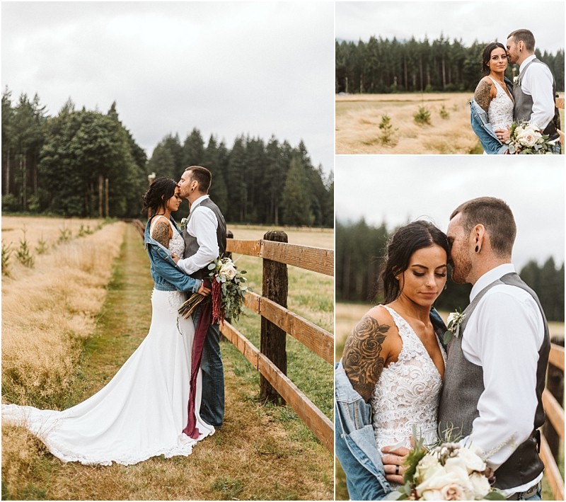 Premier snohomish & seattle wedding photographer | gsquared weddings photography a bride and groom stand close together outdoors by a wooden fence in a grassy field surrounded by trees Capturing a relaxed snohomish seattle wedding vibe they look lovingly at each otherthe bride in white dress and denim jacket the groom in vest and jeans | serving snohomish seattle                   & beyond