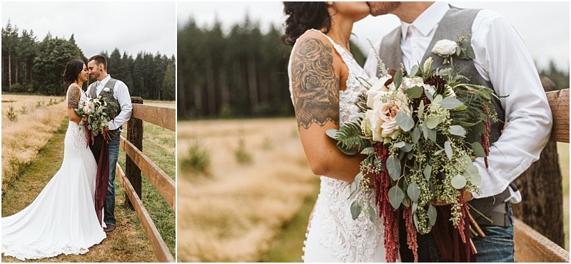 Premier snohomish & seattle wedding photographer | gsquared weddings photography a bride and groom stand close together by a wooden fence in a grassy field with trees behind them dressed in rustic wedding attire The bride holds a large bouquetperfect for a romantic snohomish seattle wedding or engagement session | serving snohomish seattle                   & beyond
