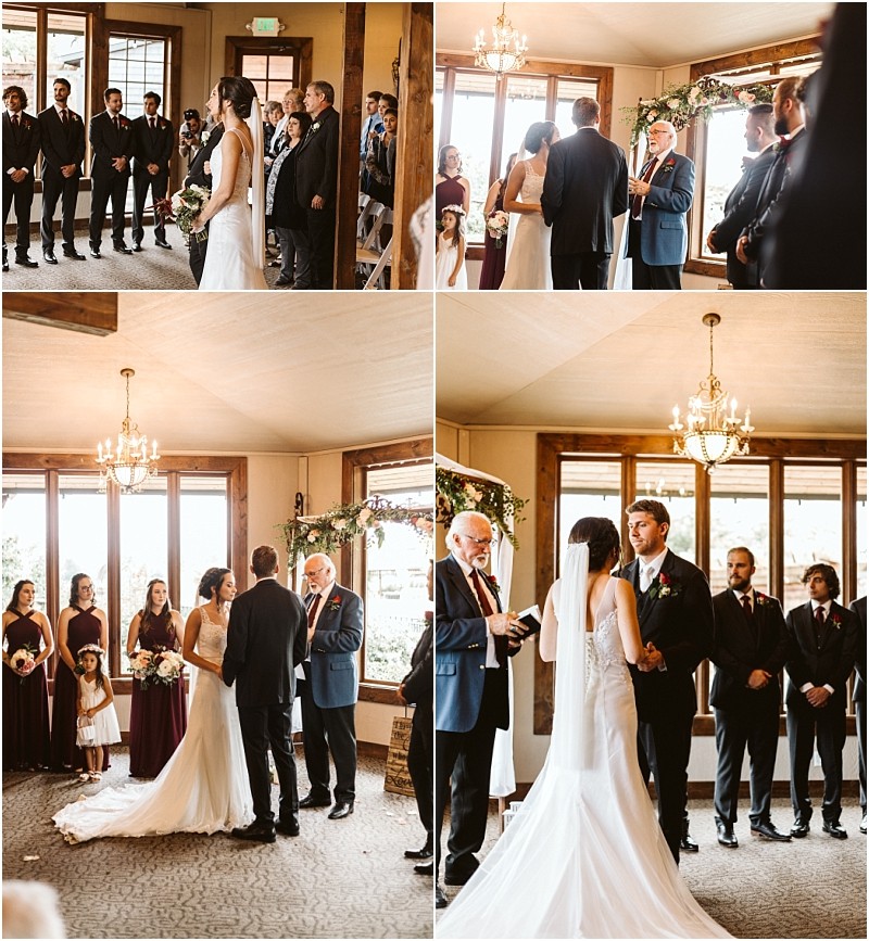 Premier snohomish & seattle wedding photographer | gsquared weddings photography a bride and groom stand with an officiant during an indoor snohomish wedding ceremony Bridesmaids in burgundy dresses and groomsmen in dark suits watch as large windows and a floral arch enhance this romantic seattle engagement celebration | serving snohomish seattle                   & beyond