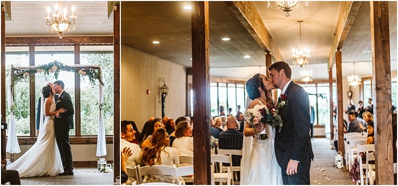 Premier snohomish & seattle wedding photographer | gsquared weddings photography a bride and groom share a kiss at their indoor snohomish wedding ceremony surrounded by guests seated on white chairs The couple stands under a decorated arch with natural light streaming through large windows | serving snohomish seattle                   & beyond