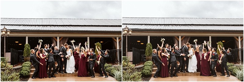 Premier snohomish & seattle wedding photographer | gsquared weddings photography a wedding party poses joyfully outside a rustic wooden building in snohomish Dressed in formal attire the group raises their arms and bouquets in celebration on a cloudy day The brides wear white and the bridesmaids wear dark red dresses | serving snohomish seattle                   & beyond