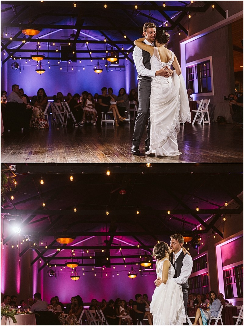 Premier snohomish & seattle wedding photographer | gsquared weddings photography a bride and groom share their first dance in a warmly lit snohomish venue with purple and pink lighting while guests watch from tables in the background at this unforgettable seattle wedding | serving snohomish seattle                   & beyond