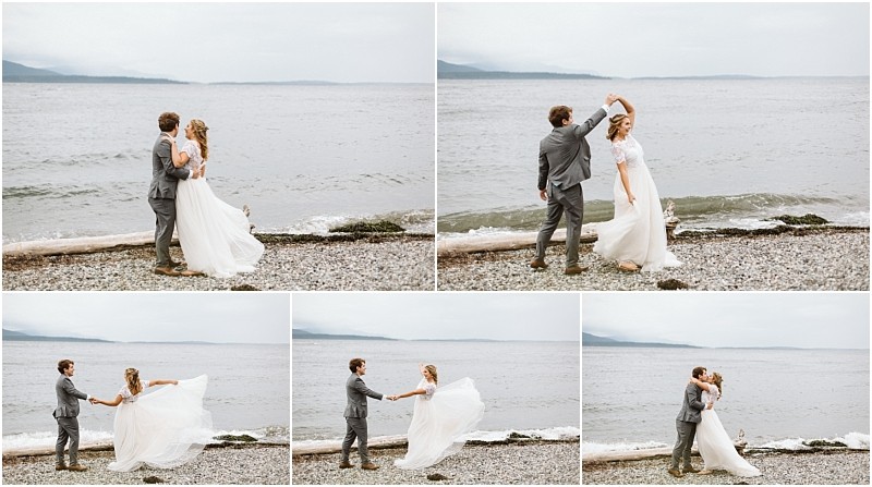 Premier snohomish & seattle wedding photographer | gsquared weddings photography a couple in wedding attire dances and twirls joyfully on a rocky beach near the water with mountains visible in the distance under a cloudy skycapturing the magic of a snohomish seattle wedding engagement | serving snohomish seattle                   & beyond