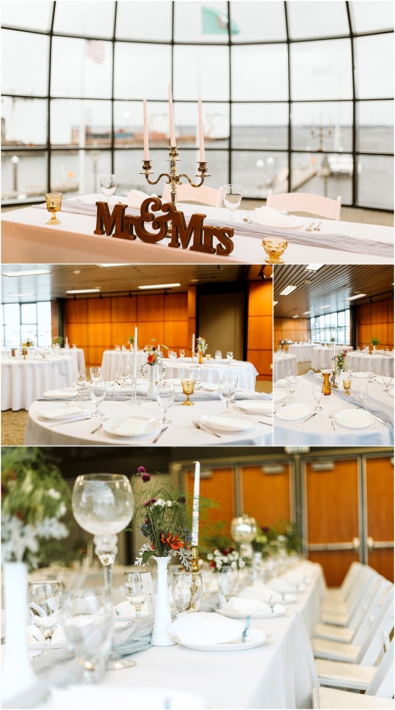 Premier snohomish & seattle wedding photographer | gsquared weddings photography a stunning snohomish wedding reception setup with round tables white tablecloths elegant glassware floral centerpieces and a gold mr & mrs  sign under a candle holder in a modern venue with large windows near seattle | serving snohomish seattle                   & beyond