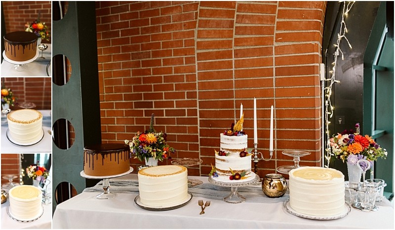 Premier snohomish & seattle wedding photographer | gsquared weddings photography a dessert table at a snohomish wedding with four cakestwo adorned in chocolate drips two with white frostingsurrounded by vibrant flower arrangements and candlesticks set before a rustic brick wall Perfect for a seattle engagement celebration | serving snohomish seattle                   & beyond