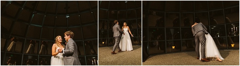 Premier snohomish & seattle wedding photographer | gsquared weddings photography a couple in wedding attire share a dance in a dimly lit snohomish venue with large dark windows reflecting their image They smile dance and embrace as newlyweds on their special night near seattle | serving snohomish seattle                   & beyond
