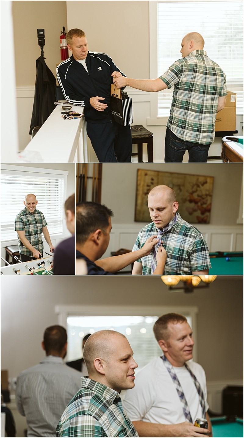 Premier snohomish & seattle wedding photographer | gsquared weddings photography a group of men in casual clothes prepare for a snohomish wedding indoors one man receives a gift looks in the mirror and gets help adjusting his shirt while chatting and laughing with friends | serving snohomish seattle                   & beyond