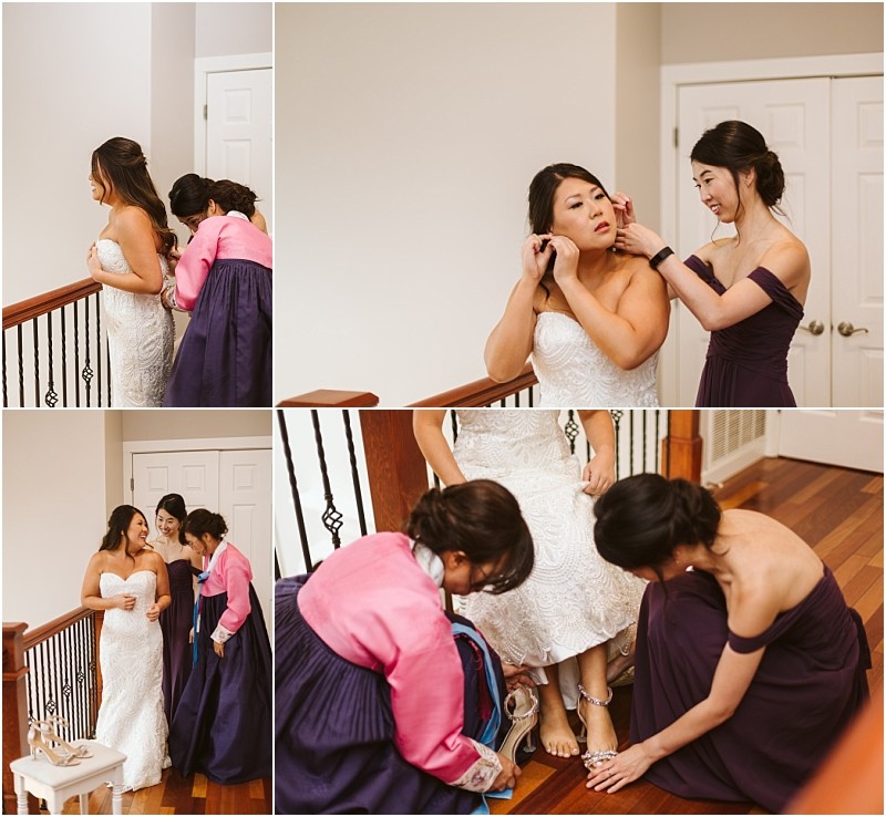 Premier snohomish & seattle wedding photographer | gsquared weddings photography a bride in a strapless white gown gets ready for her snohomish seattle wedding helped by two womenone in a purple dress and one in a pink and purple hanbokassisting with earrings her dress and shoes on a wooden staircase indoors | serving snohomish seattle                   & beyond