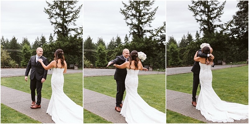 Premier snohomish & seattle wedding photographer | gsquared weddings photography a bride in a white dress and a groom in a dark suit share a joyful first look outdoors at their snohomish seattle wedding The groom smiles opens his arms and they embrace on a grassy area surrounded by trees | serving snohomish seattle                   & beyond