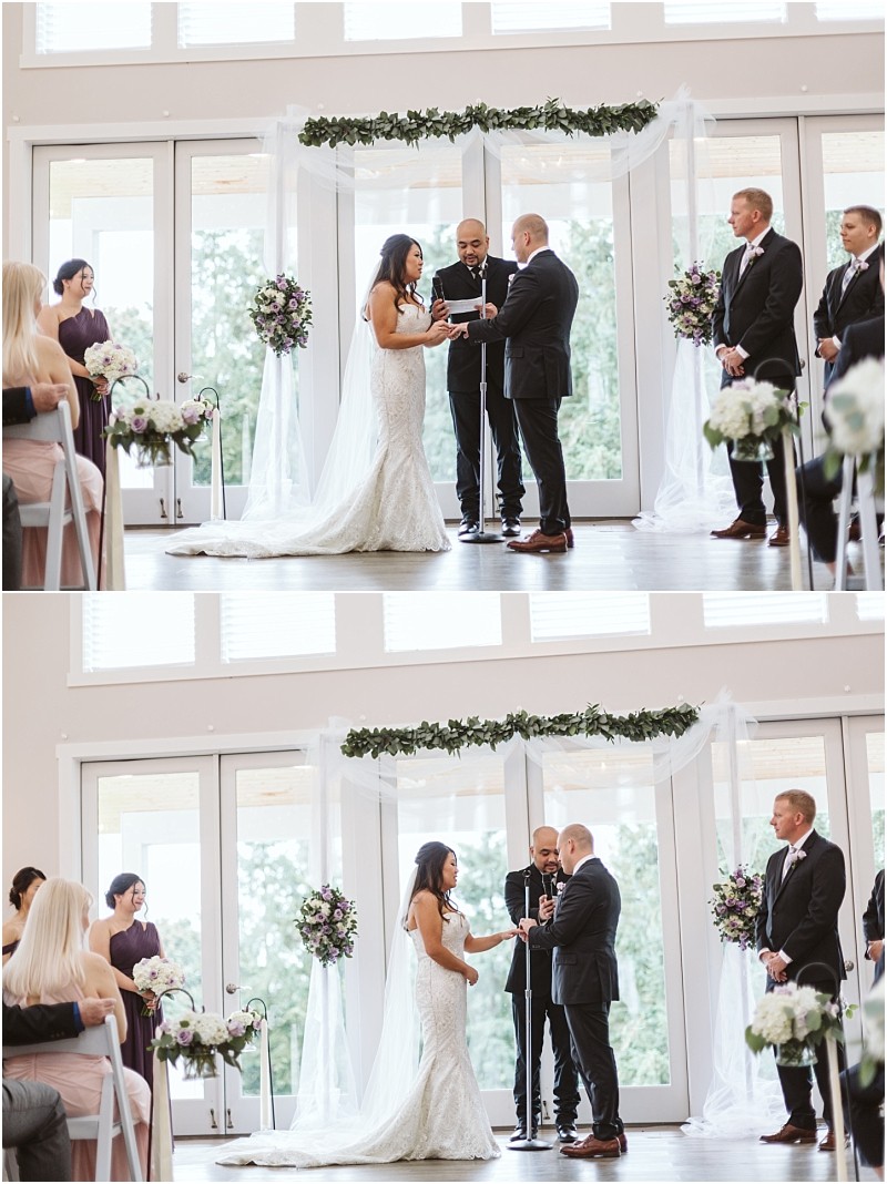 Premier snohomish & seattle wedding photographer | gsquared weddings photography a bride and groom stand facing each other at their snohomish wedding ceremony exchanging vows as an officiant speaks Bridesmaids and groomsmen stand nearby with sunlight streaming through large windows behind them | serving snohomish seattle                   & beyond