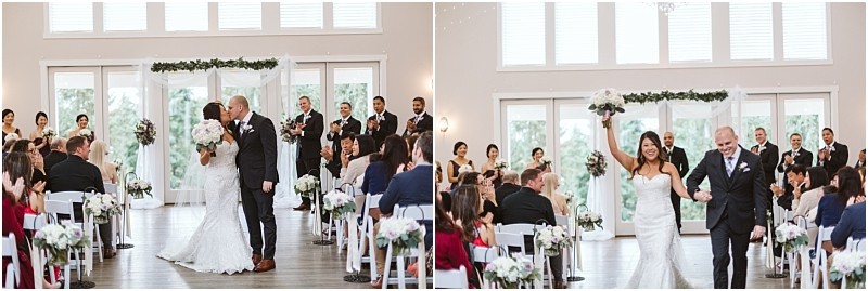 Premier snohomish & seattle wedding photographer | gsquared weddings photography a bride and groom share a kiss at the altar then walk back down the aisle smiling as guests in white chairs clap and celebrate in a bright modern snohomish wedding venue decorated with flowers | serving snohomish seattle                   & beyond