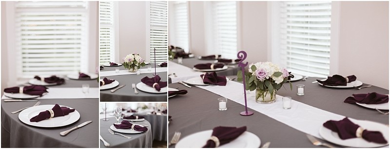 Premier snohomish & seattle wedding photographer | gsquared weddings photography a table set for a formal snohomish wedding features gray tablecloths white plates silver cutlery purple napkins and a floral centerpiece with white and purple flowers Sunlight streams through the white blinds behind | serving snohomish seattle                   & beyond