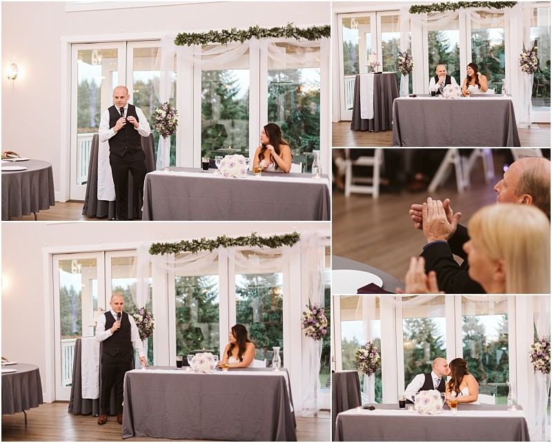 Premier snohomish & seattle wedding photographer | gsquared weddings photography a man gives a speech at a snohomish wedding reception standing beside a seated bride while guests watch and applaud The event takes place in a bright room with large windows and floral decorations | serving snohomish seattle                   & beyond
