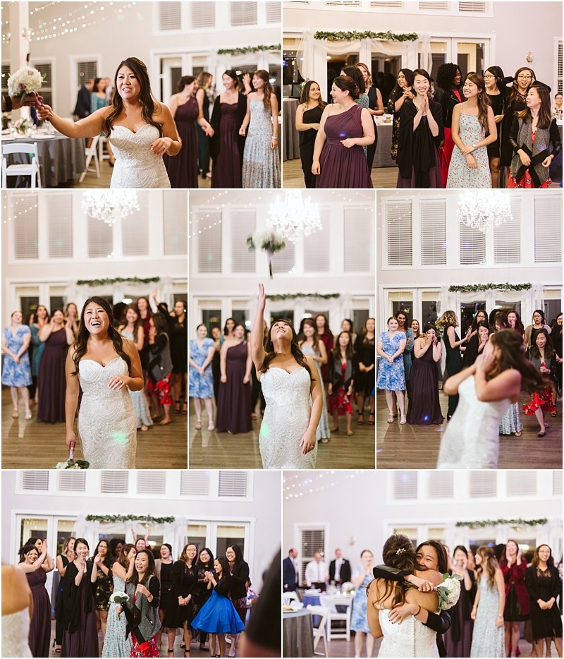 Premier snohomish & seattle wedding photographer | gsquared weddings photography at a joyful snohomish wedding a bride in a white dress tosses her bouquet to smiling women at the reception one guest catches it and hugs the bride as others cheer and laugh in the bright decorated hall | serving snohomish seattle                   & beyond
