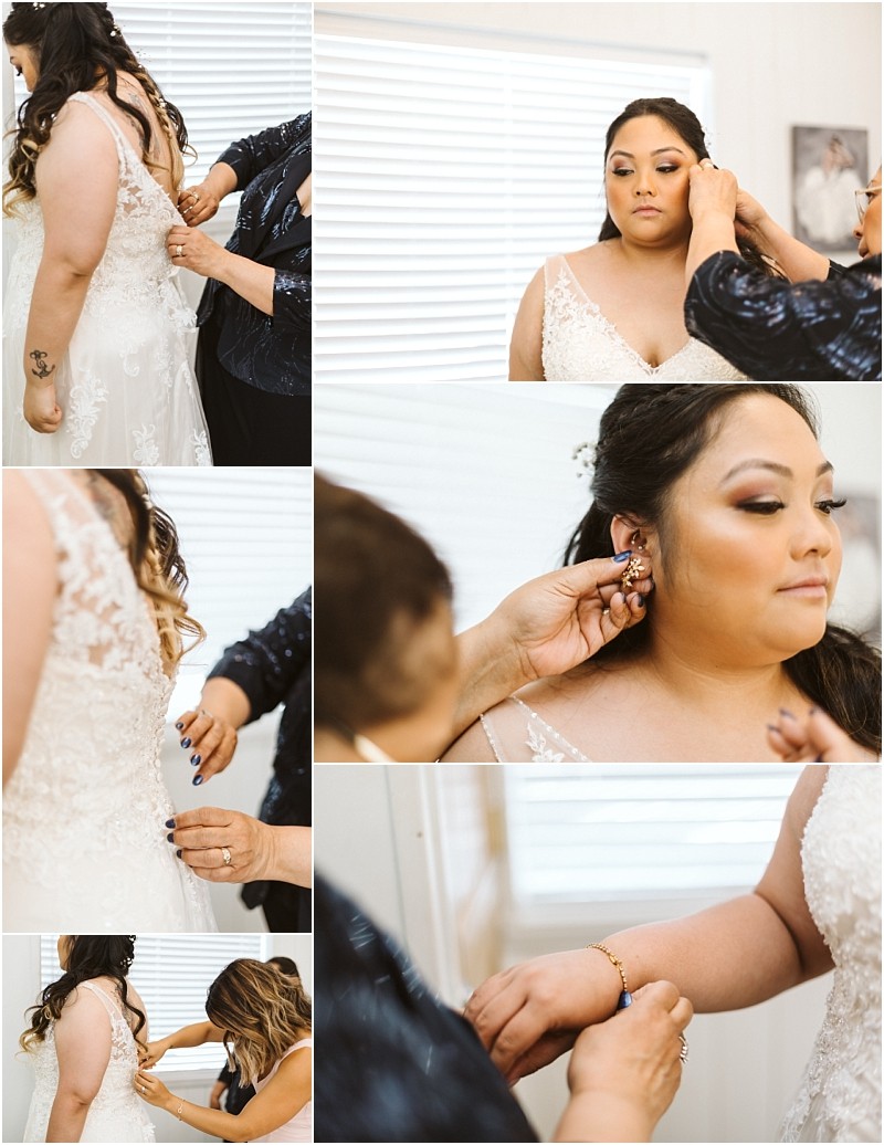 Premier snohomish & seattle wedding photographer | gsquared weddings photography a bride in a lace gown gets ready for her snohomish wedding as someone helps zip her dress and adjust her earrings Calm and focused she prepares for the special seattle engagement in a softly lit room | serving snohomish seattle                   & beyond