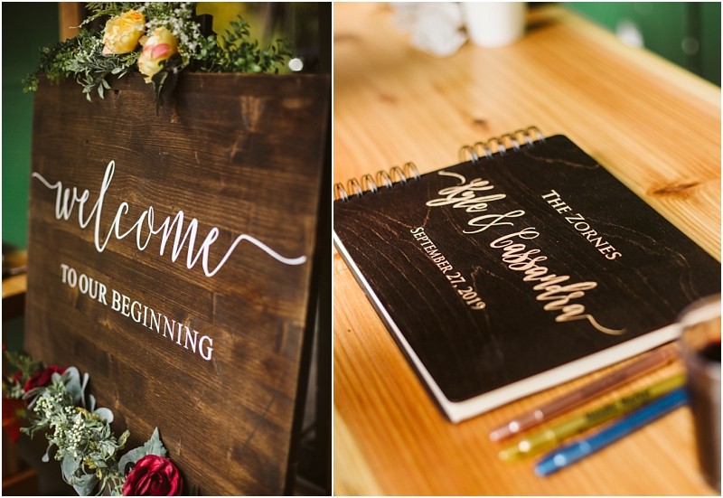 Premier snohomish & seattle wedding photographer | gsquared weddings photography a wooden sign with white lettering reads welcome to our beginning surrounded by flowers At this snohomish seattle wedding a guestbook labeled the zones kyle & cassandra september 21 2019 sits on a table with pens | serving snohomish seattle                   & beyond