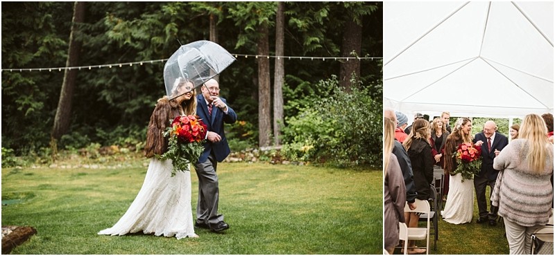 Premier snohomish & seattle wedding photographer | gsquared weddings photography a bride in a white dress and brown shawl walks outside under a clear umbrella with an older man Guests wait under a white tent as the pair proceed down the grassy aisle at this charming snohomish outdoor wedding | serving snohomish seattle                   & beyond