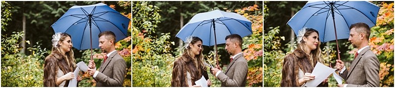Premier snohomish & seattle wedding photographer | gsquared weddings photography a couple stands outdoors under a blue umbrella in snohomish exchanging vows and holding papers surrounded by autumn foliage The woman wears a fur stole and headpiece the man is in a brown suita perfect seattle wedding moment | serving snohomish seattle                   & beyond