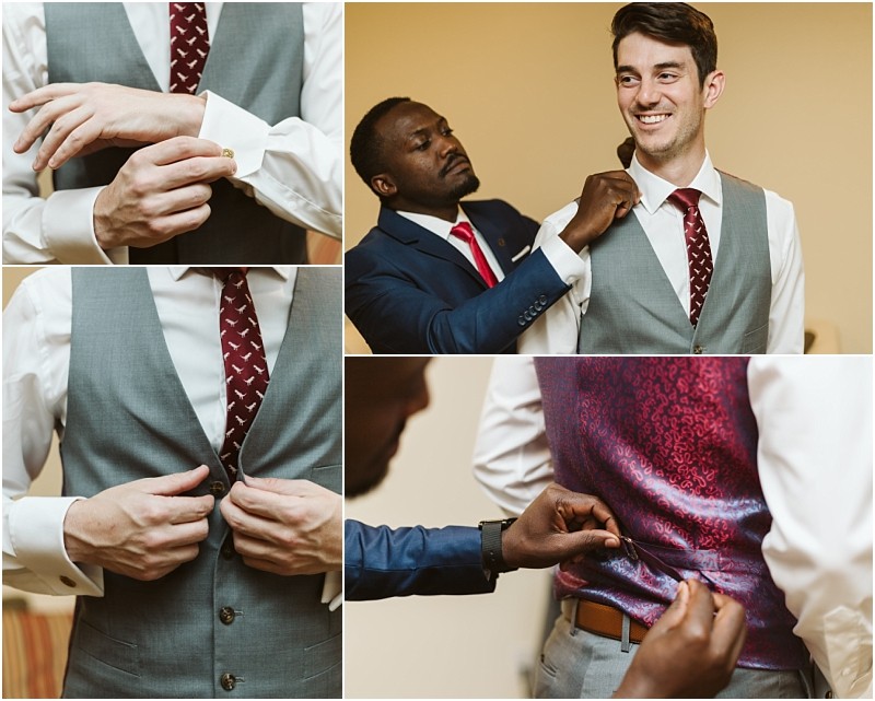 Premier snohomish & seattle wedding photographer | gsquared weddings photography a man in a grey suit and red tie gets ready for a snohomish seattle wedding with help from another man in a blue suit close ups show cufflinks vest buttons adjusting the tie and fastening the back of the vest | serving snohomish seattle                   & beyond