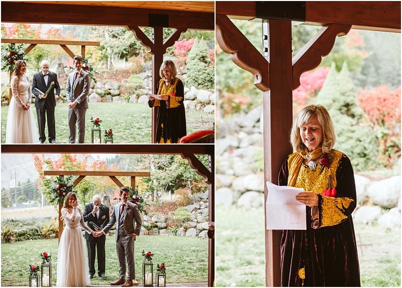 Premier snohomish & seattle wedding photographer | gsquared weddings photography a woman in a long ornate dress reads from a paper during an outdoor snohomish wedding ceremony while a couple stands with an officiant under a wooden pavilion surrounded by colorful autumn trees | serving snohomish seattle                   & beyond