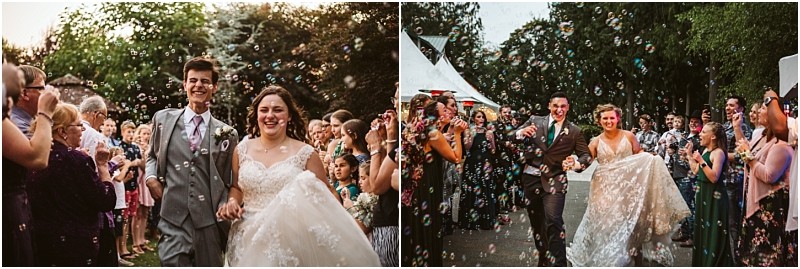 Premier snohomish & seattle wedding photographer | gsquared weddings photography two newlywed couples walk joyfully through crowds of guests blowing bubbles at festive snohomish and seattle wedding celebrations surrounded by smiles and love | serving snohomish seattle                   & beyond