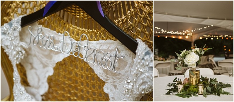 Premier snohomish & seattle wedding photographer | gsquared weddings photography a lace wedding dress hangs on a black hanger with mrs Deforest in wire beside it a tented snohomish reception table is decorated with white flowers greenery and gold accents under string lights | serving snohomish seattle                   & beyond