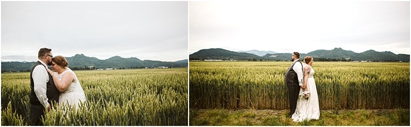 Premier snohomish & seattle wedding photographer | gsquared weddings photography a bride and groom share a quiet intimate moment in a green wheat field near snohomish with mountains in the background and a cloudy sky overheada perfect seattle wedding engagement scene | serving snohomish seattle                   & beyond