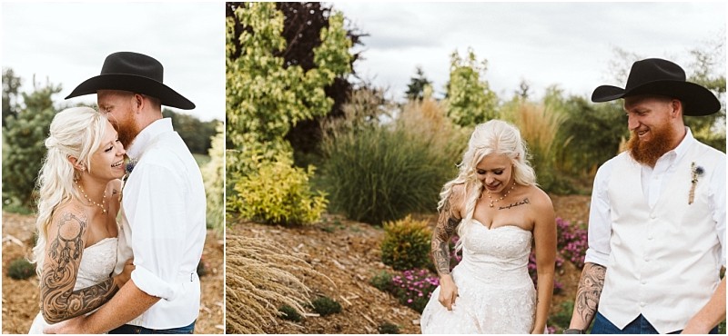 Premier snohomish & seattle wedding photographer | gsquared weddings photography a bride in a strapless white dress and a groom in a cowboy hat and vest smile and laugh together outdoors surrounded by greenery and flowers during their snohomish seattle wedding | serving snohomish seattle                   & beyond