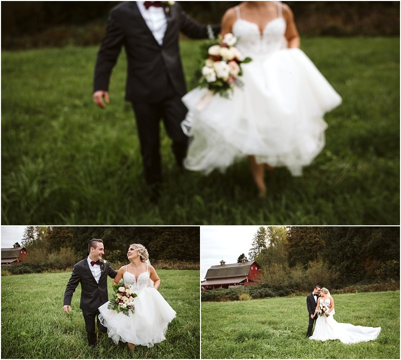 Snohomish & seattle wedding photographer | gsquared weddings photography best of 2019 wedding couples walk together and embrace in a grassy field with a bride in a white dress and groom in a black suit framed by a red barn and trees in the background | wedding photo by gsquared weddings