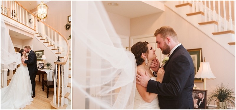 Snohomish & seattle wedding photographer | gsquared weddings photography a bride and groom share a romantic moment in a warmly lit home during their marysville wedding with a staircase in the background The brides veil flows framed photos and a piano nearby as they look happy and in love | wedding photo by gsquared weddings