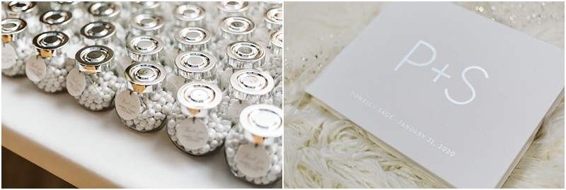 Snohomish & seattle wedding photographer | gsquared weddings photography small glass jars filled with white candies are arranged in rows each with a silver lid and label Next to them is a beige card with p + s and a date printed in white hinting at a marysville wedding all resting on textured cream fabric | wedding photo by gsquared weddings