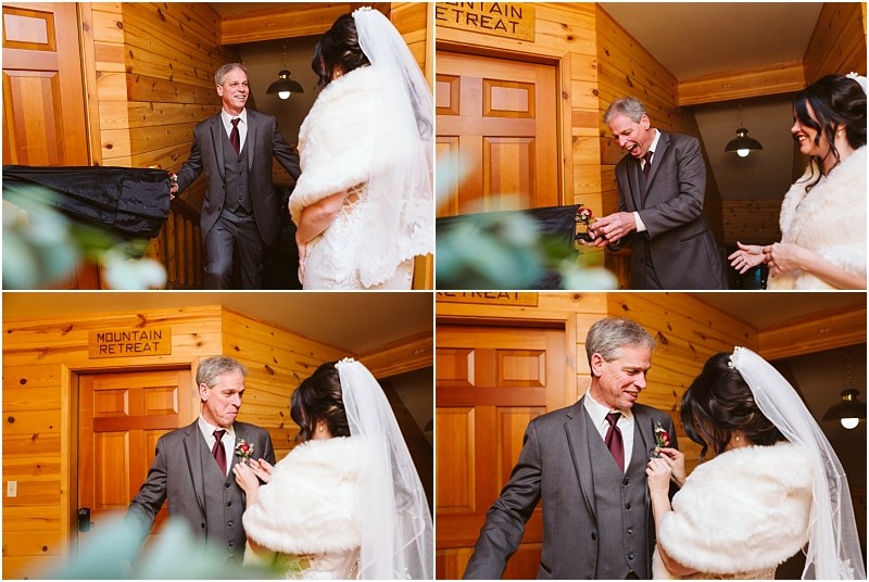 Snohomish & seattle wedding photographer | gsquared weddings photography a bride in a white dress and veil shares an emotional joyful moment with an older man in a grey suit inside the wood paneled mountain retreat during a leavenworth wedding | wedding photo by gsquared weddings