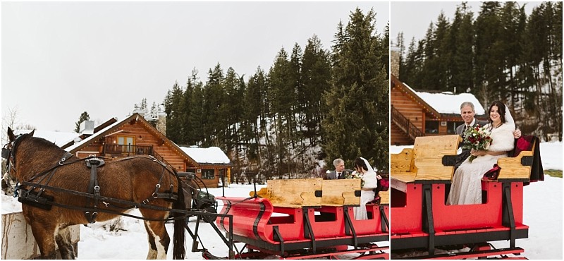 Snohomish & seattle wedding photographer | gsquared weddings photography a bride and groom ride in a red horse drawn sleigh through snow near wooden cabins and pine trees smiling in their wedding attirea magical leavenworth wedding scene | wedding photo by gsquared weddings