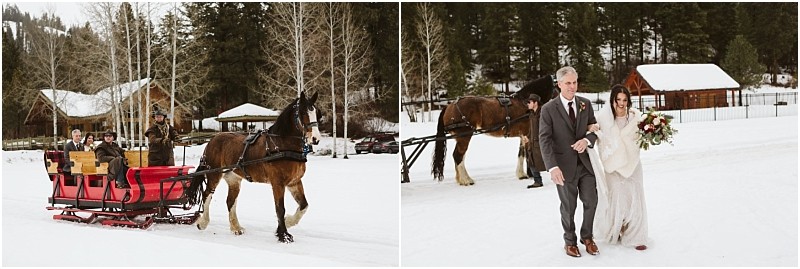 Snohomish & seattle wedding photographer | gsquared weddings photography a bride in a white dress and shawl arrives at her snowy leavenworth wedding in a red horse drawn sleigh then walks arm in arm with an older man past log cabins and pine trees | wedding photo by gsquared weddings