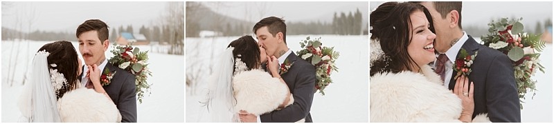 Snohomish & seattle wedding photographer | gsquared weddings photography a bride and groom stand outside in the snow holding each other and smiling The bride wears a white dress and fur shawl the groom a dark suit and floral boutonniere The snowy rural landscape hints at a magical leavenworth wedding | wedding photo by gsquared weddings