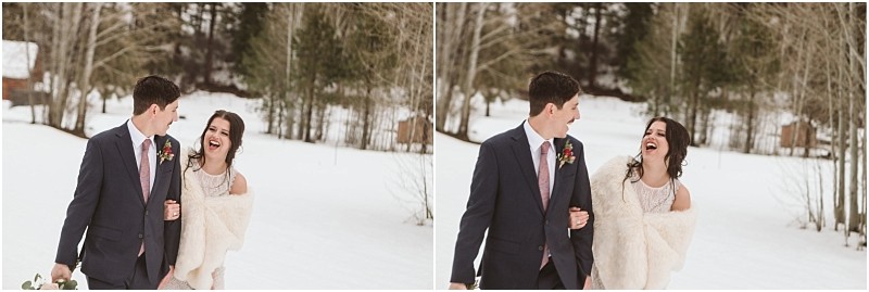 Snohomish & seattle wedding photographer | gsquared weddings photography a smiling couple dressed in formal attire walks arm in arm outdoors on a snowy day laughing together amid bare trees and a snow covered groundcapturing the joy of their leavenworth wedding | wedding photo by gsquared weddings