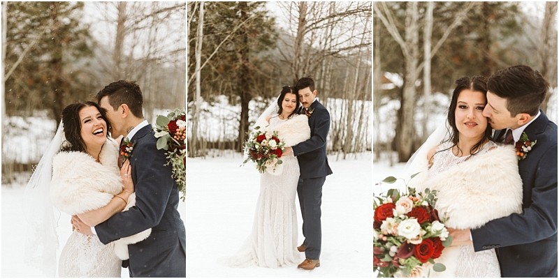 Snohomish & seattle wedding photographer | gsquared weddings photography a bride and groom embrace outdoors in a snowy landscape during their leavenworth wedding She wears a white gown fur shawl and holds a bouquet of red and white flowers both smile sharing affectionate moments among bare trees | wedding photo by gsquared weddings