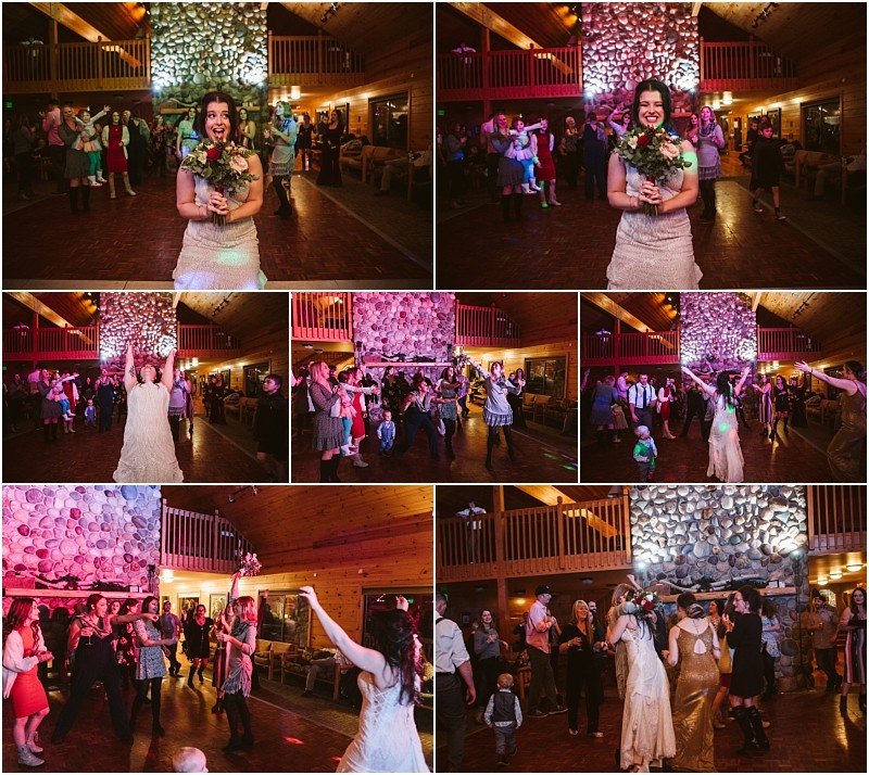 Snohomish & seattle wedding photographer | gsquared weddings photography a bride in a white dress tosses her bouquet to excited women on a rustic wood paneled dance floor at a leavenworth wedding reception with guests watching and colorful lights illuminating the scene | wedding photo by gsquared weddings
