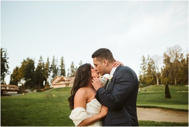 Wedding couple on a golf course after their micro wedding in washington state