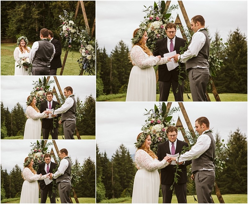 Snohomish & seattle wedding photographer | gsquared weddings photography a bride and groom exchange vows and rings outdoors in front of a floral arch with a celebrant officiating surrounded by green grass and trees under a cloudy skya perfect machias elopement filled with love with a view | wedding photo by gsquared weddings