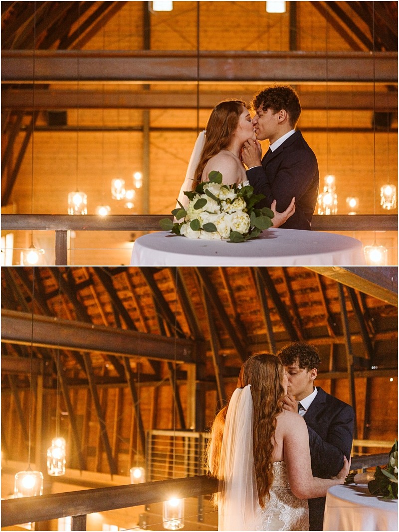 Snohomish & seattle wedding photographer | gsquared weddings photography two photos of a bride and groom sharing a romantic moment at their marionfield farm elopement They embrace and kiss near a table with a white bouquet surrounded by glowing hanging lights and exposed wooden beams | wedding photo by gsquared weddings