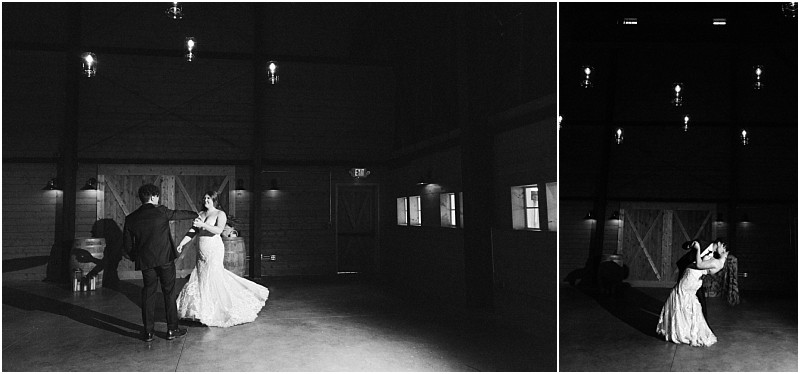 Snohomish & seattle wedding photographer | gsquared weddings photography black and white photo of a bride and groom dancing together in a spacious dimly lit barn at marionfield farm elopement The bride wears a flowing gown and the groom is in a suit beneath rustic wooden walls and glowing overhead lights | wedding photo by gsquared weddings