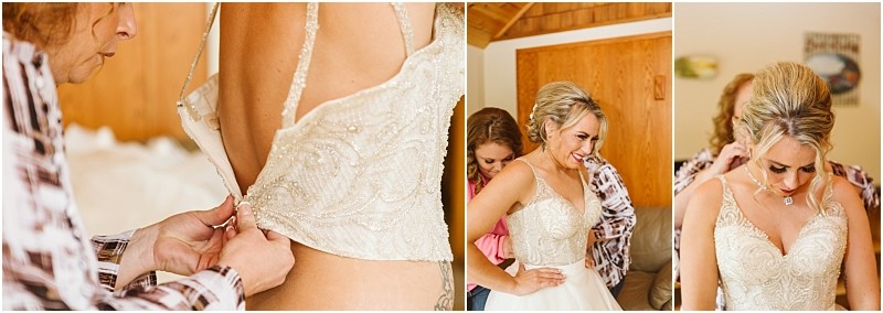 Snohomish & seattle wedding photographer | gsquared weddings photography a bride in a beaded wedding dress is helped by a woman as she gets ready for her methow elopement Close up and wider shots show the dress being zipped up and the bride smiling and looking down during final adjustments | wedding photo by gsquared weddings