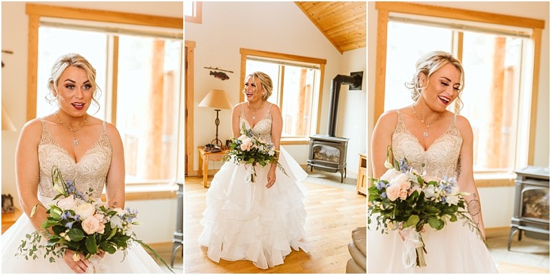 Snohomish & seattle wedding photographer | gsquared weddings photography a bride in a white wedding dress holds a bouquet of flowers smiling and posing indoors in a bright wooden room with large windows and natural light during her intimate methow elopement | wedding photo by gsquared weddings