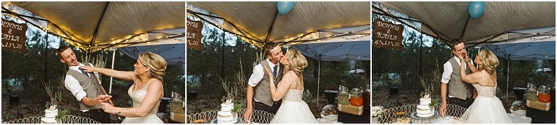 Snohomish & seattle wedding photographer | gsquared weddings photography a bride playfully smears cake on the grooms face at an outdoor methow elopement reception as they laugh under a decorated canopy with cake and drinks visible in the background | wedding photo by gsquared weddings