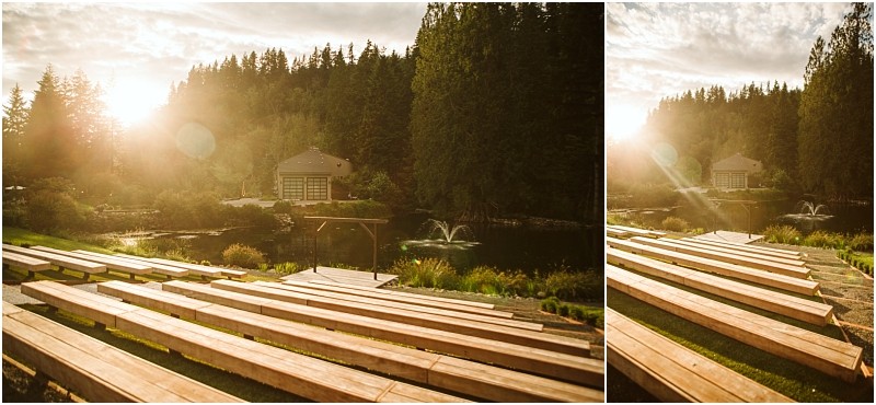 Snohomish & seattle wedding photographer | gsquared weddings photography wooden benches are arranged in rows facing a small lake with a fountain and a distant gray bridge surrounded by trees Sunlight streams through the branches casting a warm golden glow over the outdoor setting | wedding photo by gsquared weddings