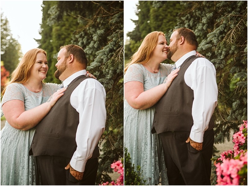 Snohomish & seattle wedding photographer | gsquared weddings photography a smiling couple stands close together outdoors by greenery and pink flowers during their gray bridge engagement In one image they gaze at each other in the other they share an affectionate kiss both looking happy and relaxed | wedding photo by gsquared weddings