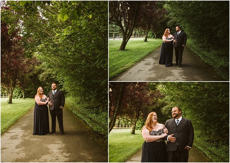 Snohomish & seattle wedding photographer | gsquared weddings photography a couple dressed formally stands and walks together on a tree lined path in a park sharing smiles and laughter Their gray bridge engagement radiates happiness and relaxation amidst the lush greenery | wedding photo by gsquared weddings