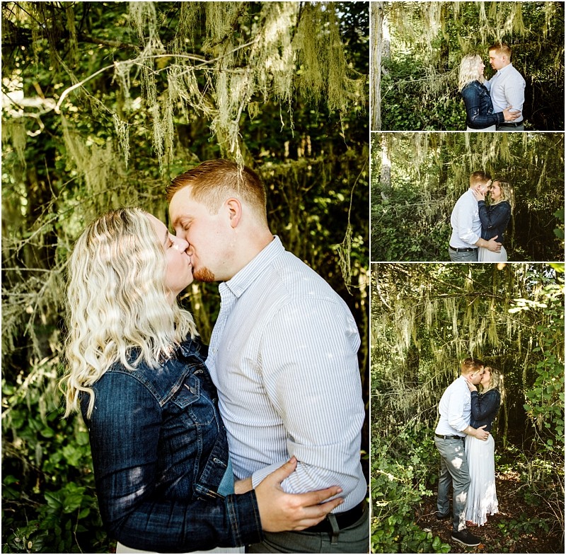 Snohomish & seattle wedding photographer | gsquared weddings photography a couple shares a kiss and embraces in a lush green outdoor setting at deception pass whidbey island The woman has wavy blonde hair and wears a denim jacket the man in a striped shirt is surrounded by moss and greenery | wedding photo by gsquared weddings