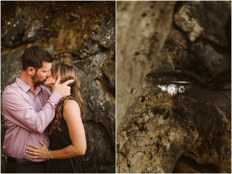 Snohomish & seattle wedding photographer | gsquared weddings photography a couple kisses in front of a rocky background at deception pass on the right a diamond engagement ring rests on a textured rock surface capturing their august engagement | wedding photo by gsquared weddings